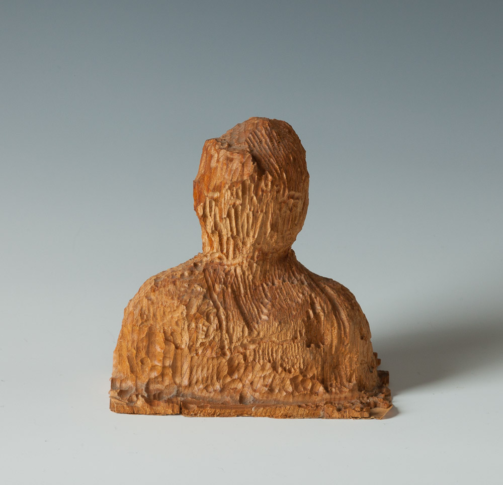 010 Bust h 4.75" x w 4.5" x d 2.75"  carved wood